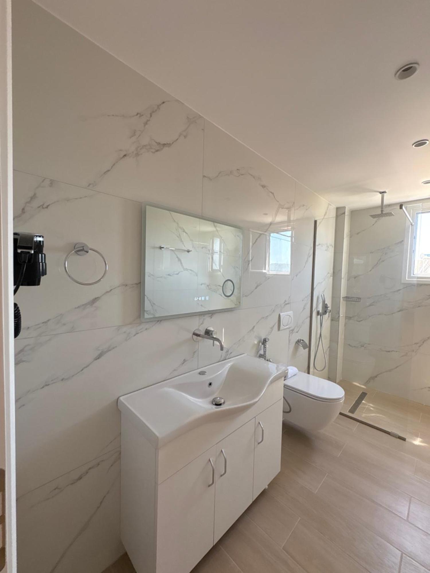 Xhonis Apartments คซามิล ภายนอก รูปภาพ