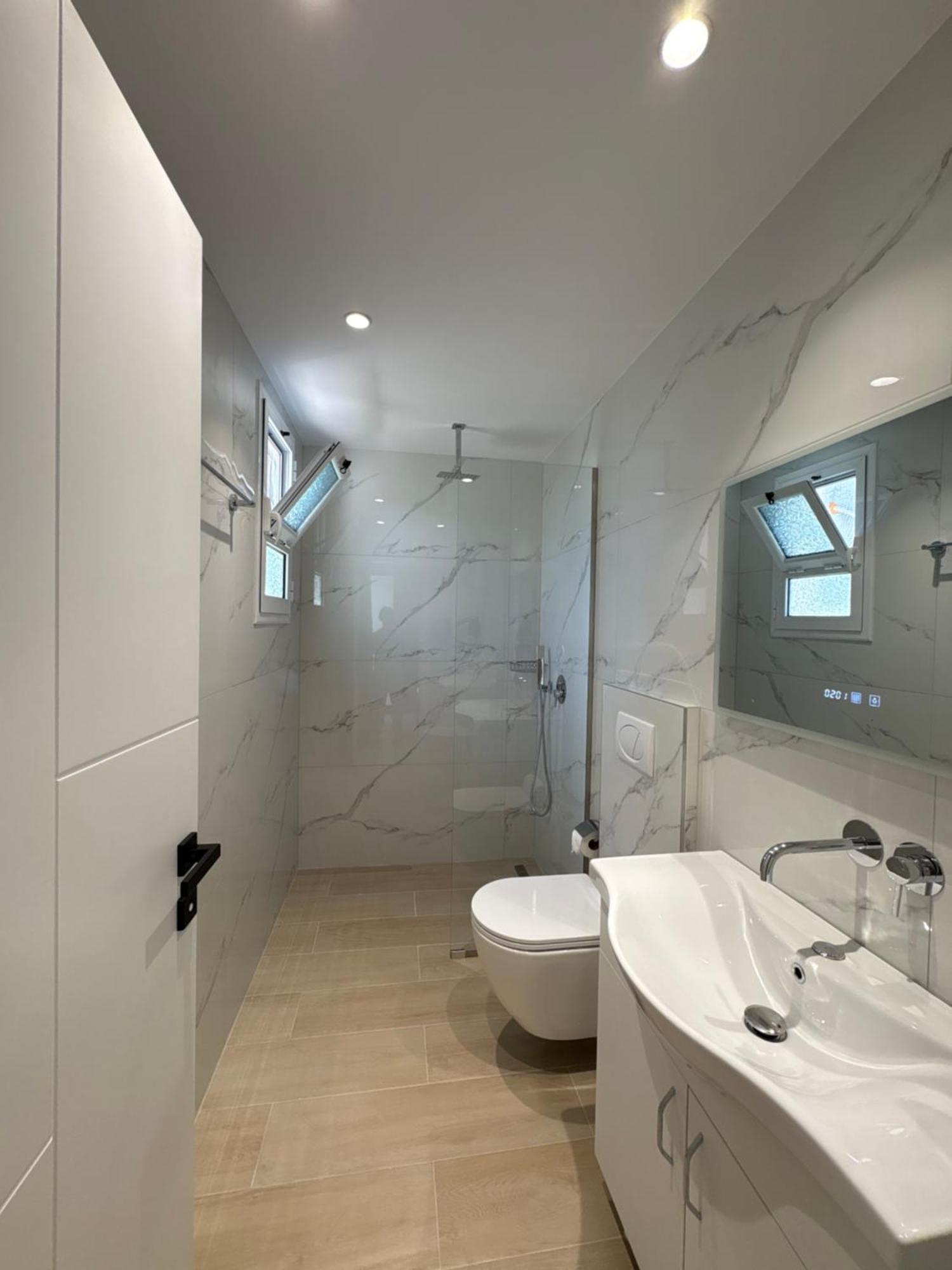 Xhonis Apartments คซามิล ภายนอก รูปภาพ